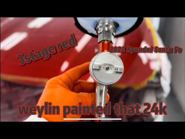 2022 Hyundai Santa Fe 3 stage red pearl.