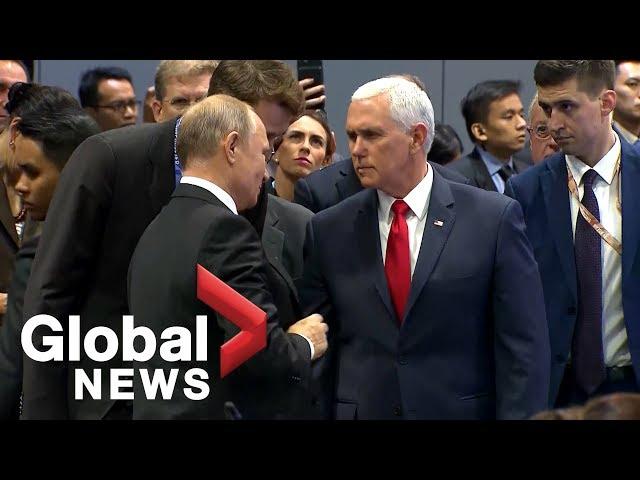 Mike Pence greets Vladimir Putin with handshake at ASEAN Summit