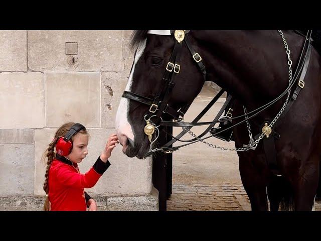 A Touch of Kindness: When the King's Guard Met a Special Little Girl"