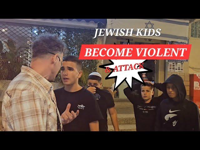 JEWISH KIDS BECOME VIOLENT AND ATTACK THE STREET PREACHERS BECAUSE OF THE NAME OF JESUS. #ISRAEL