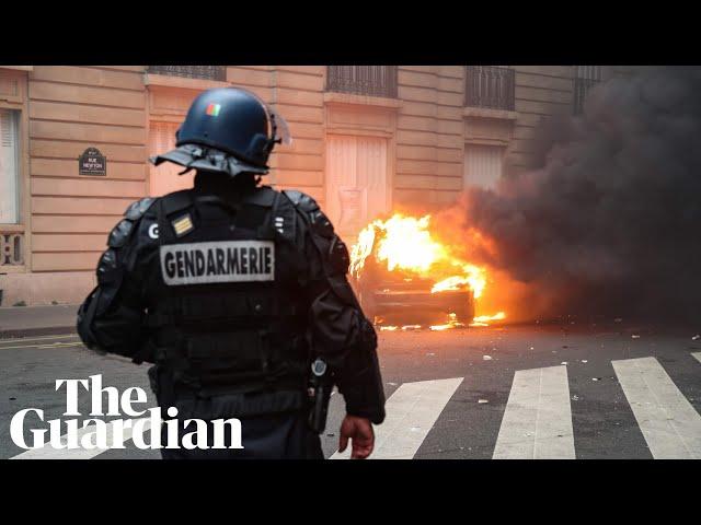 Riot police use teargas and water cannon in clashes with gilets jaunes in Paris