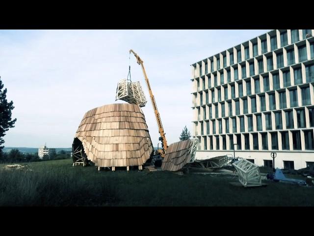 ETH Zurich students create robot-built pavilion featuring wooden shingles and latticed framework