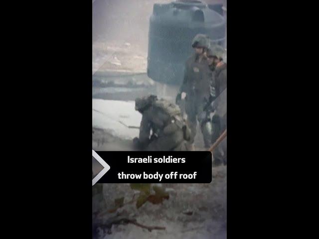 Israeli soldiers throw body off roof