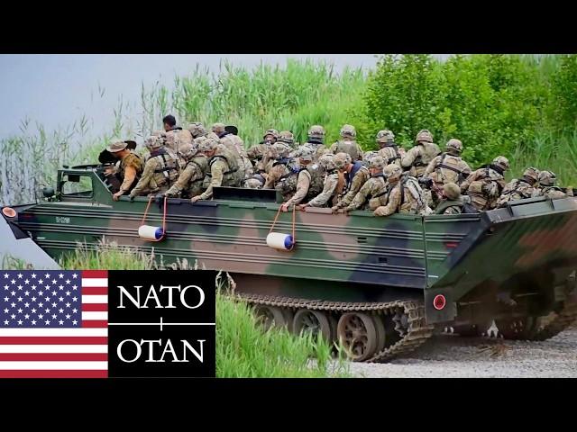 US Army, NATO. Soldiers and armored vehicles during military exercises in Poland.