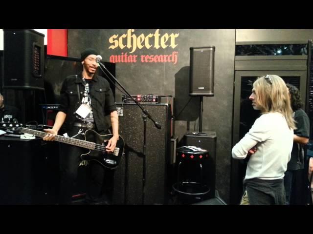 Dug Pinnick at the Schecter booth with Rex Brown checking out his amp