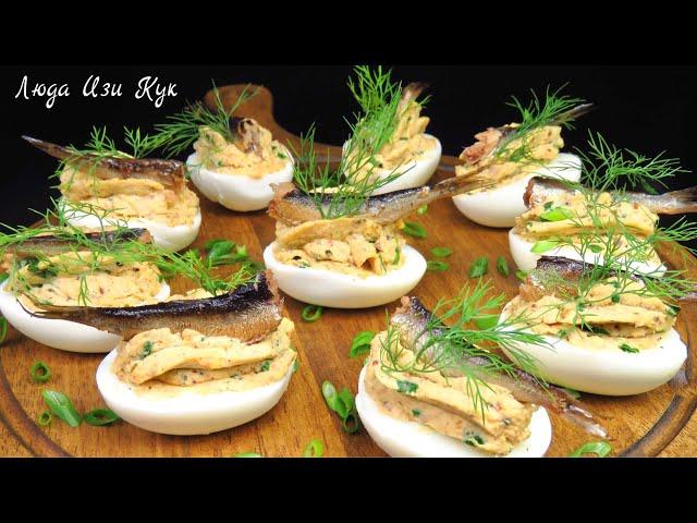 Deviled eggs appetizer for new year party Delicious snack Stuffed eggs with sprats Christmas recipe