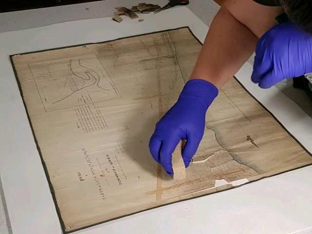 Art Conservation - Surface cleaning an 1848 map of Sarnia, Ontario, Canada.