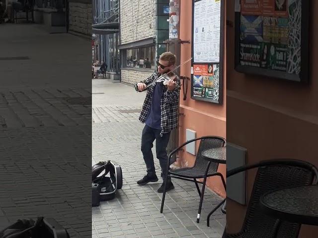 Tones and I: Dance Monkey. Street performance in the Old Town of Tallinn, Estonia. Violin play.