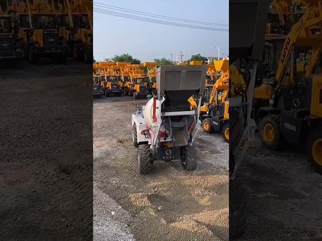 Self-loading concrete mixer