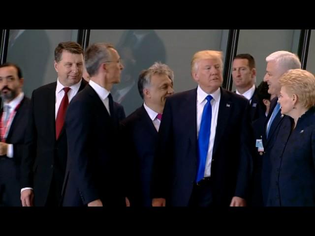 Trump shoves fellow leader