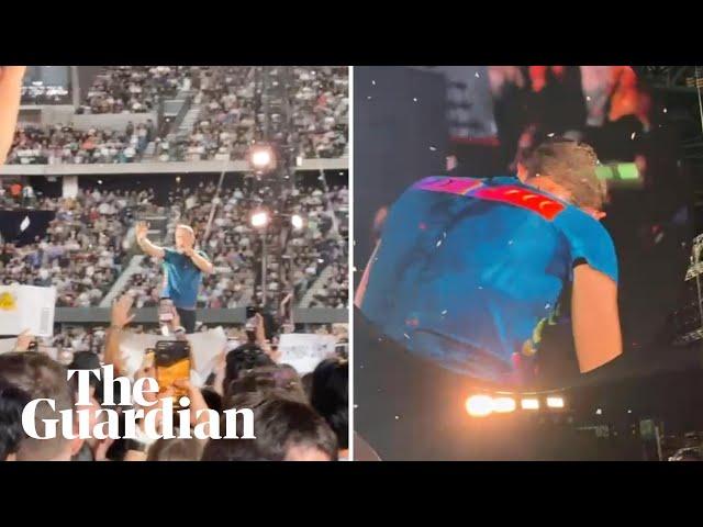Coldplay's Chris Martin falls through stage during Melbourne concert on Australia tour