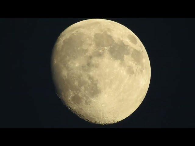 Guy Uses Camera to Zoom in on Moon