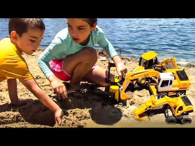 Playing with Construction Truck Toys at the Beach! | Toy Trucks for Kids | JackJackPlays