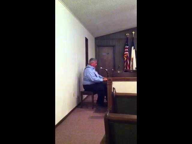 Gilbert Forrest singing "Baptism of Jesse Taylor