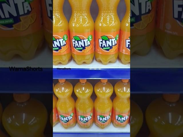 Fanta orange carbonated drinks in the big bottle #lemon #drink #orange #carbonated #ice #sprite