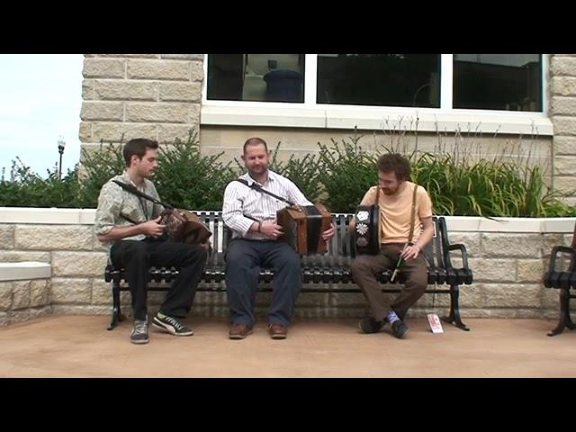 Members of Beoga performing at Floyd's Bench in Downtown Muskegon