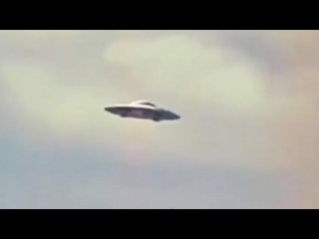 The Clearest And Detailed Silver Metallic Flying Saucer Filmed Flying Over People's Home's