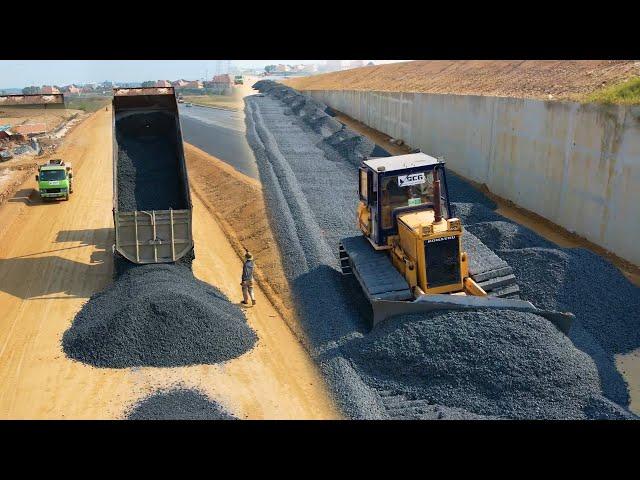 Driver Skills Bulldozer Komatsu Push gravel Rock​ black Road construction, Dump Truck Unloading