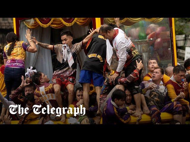 Millions of Filipinos swarm statue of Jesus for Black Nazarene procession