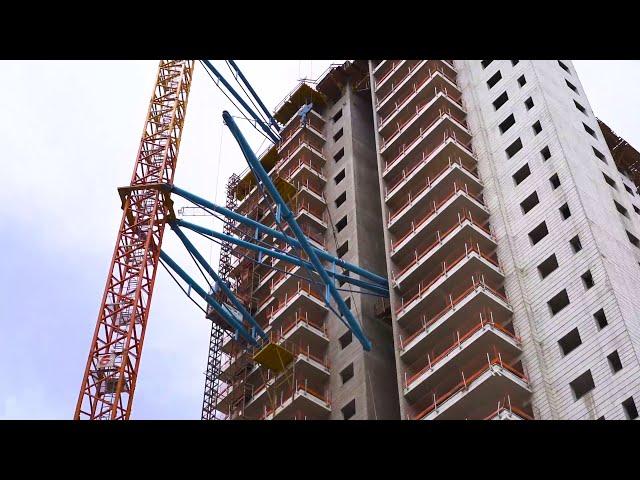 רמא עגורנים | קשירת עגורן צריח לבניין | Tower Crane massive tying system for hight building