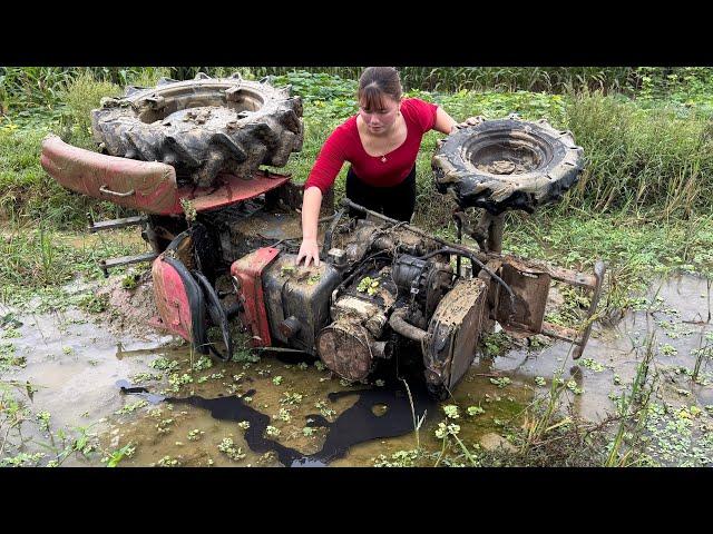 The girl repairs and restores old car agriculture that was abandoned a long time \ Blacksmith Girl