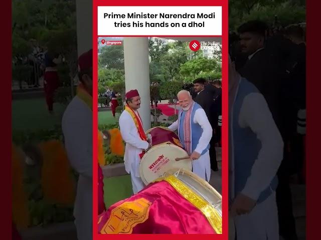 PM Modi plays Dhol during warm welcome by Indian diaspora in Singapore