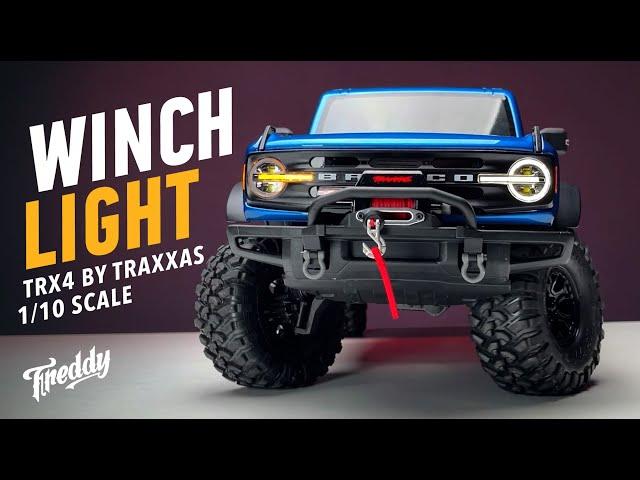 Bronco has become even more capable by installing a winch and original light. TRX4 by Traxxas.