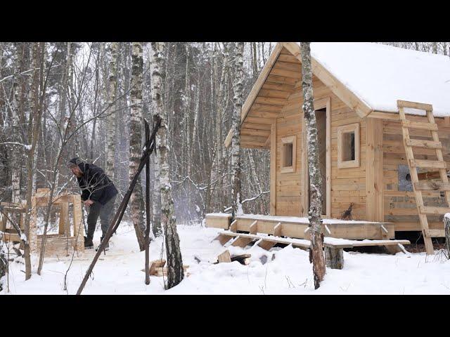 winter work inside my log cabin , unusual walls made with an axe