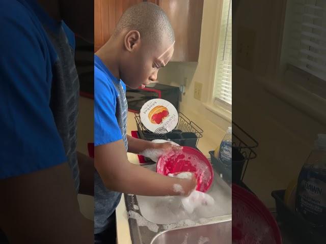 JB’s first time hand washing dishes!! #autismawareness 