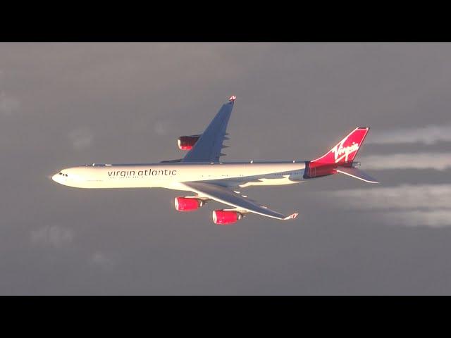 EXTREME close-up air to air race between a B747 and an A340!