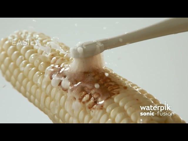 Help Keep Your Smile Healthy Between Dental Visits with Waterpik™ Sonic-Fusion™ (Corn Demo 0:30)