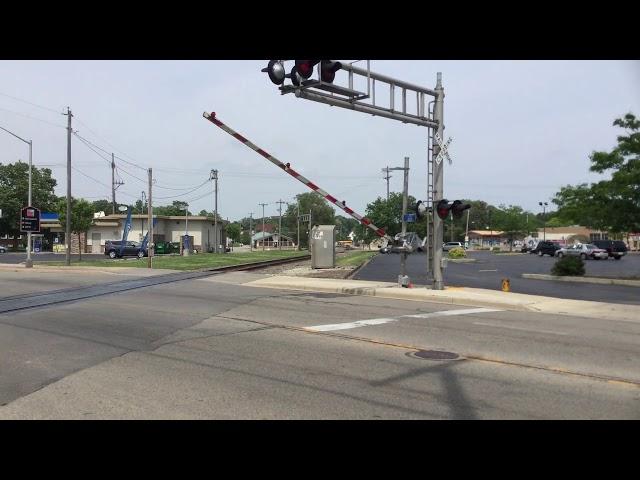 Canadian National 8872 And 2506 Leads A Freight Train In Waukesha