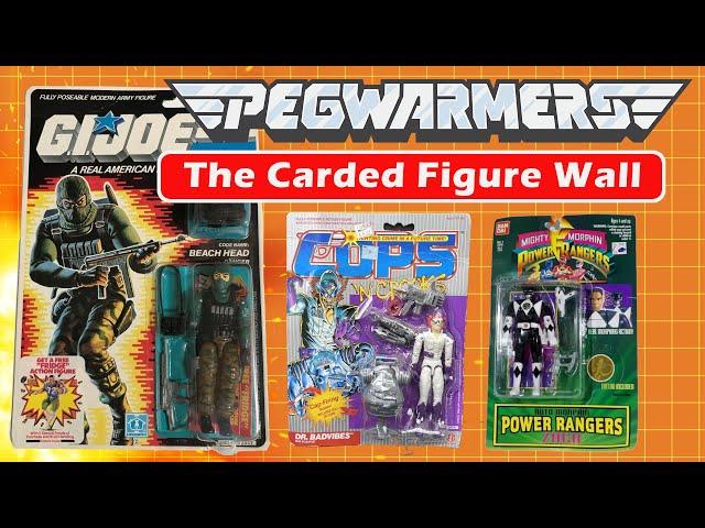 The Carded Figure Wall - Pegwarmers