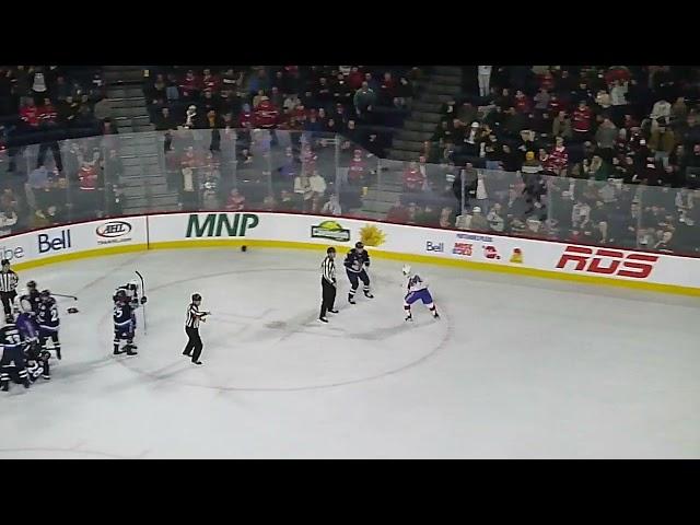 Laval Rocket's Riley McKay and Manitoba Moose's Jeff Malott get into a fight at the end of the game