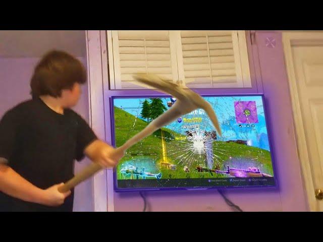 Kid DESTROYS $4000 TV over Fortnite.. (RAGE)