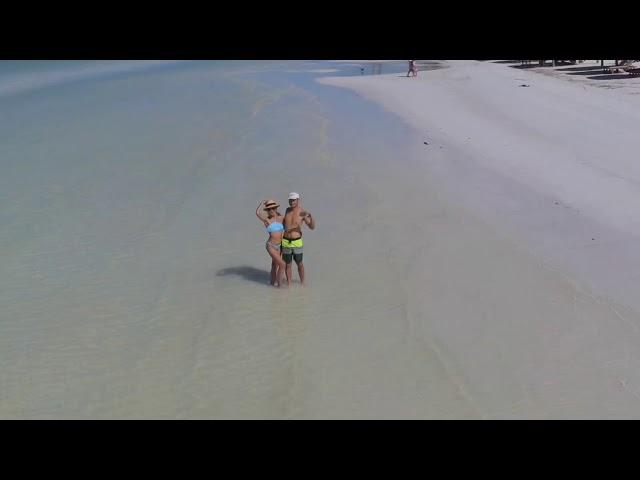 The BEST beach you can walk along to get beer and food is Isla Holbox