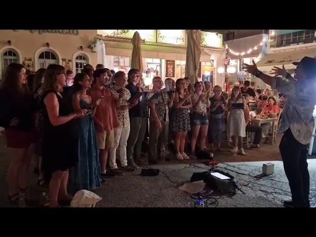 Members of London City Voices sing Kokkino Garryfallo in Spetses, Greece.