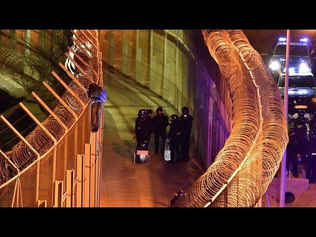 Morocco: Migrants storm border fence into Spain's Ceuta enclave