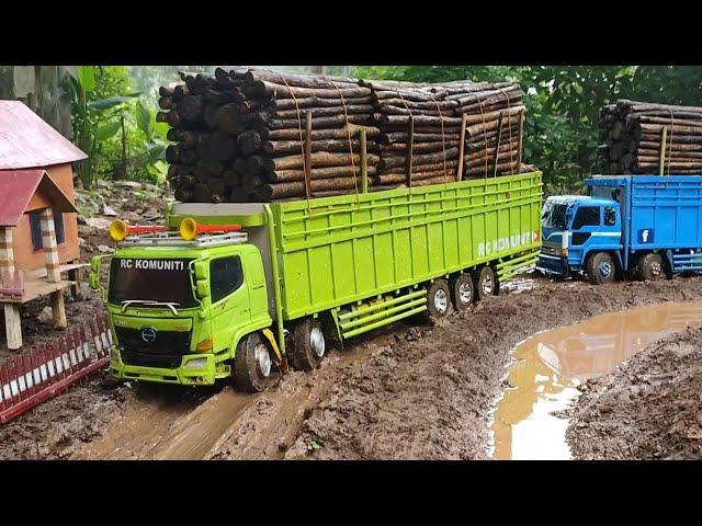 MOBIL RC TRUK HINO TRIBAL DAN FUSO BELAP BERMUATAN FUL KAYU MELEWATI JALAN BERLUMPUR OFROAD