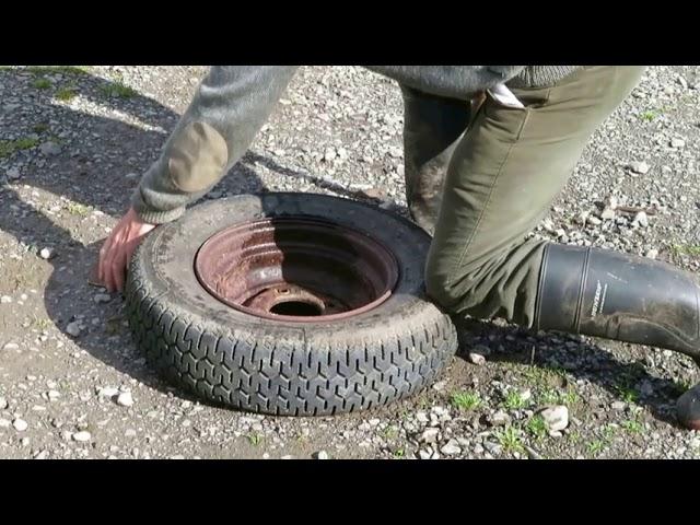 Break or crack the bead on a tyre with a piece of angle iron