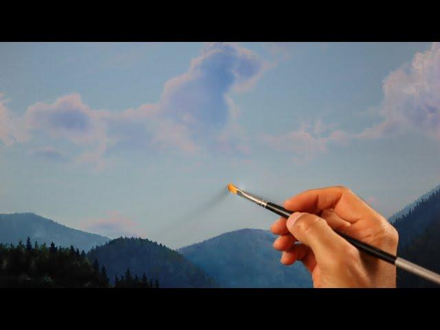 Painting hazy clouds on a landscape