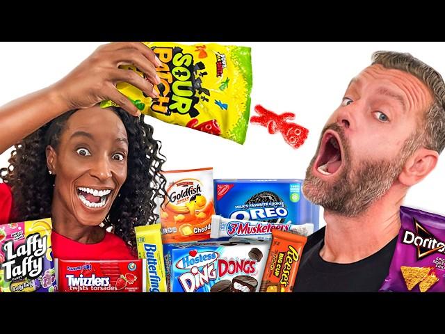 Brits Try American SNACKS and CANDY For The FIRST TIME!