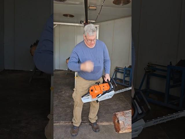 Showing Chinese Boss how to Use 881 Stihl Chainsaw: warning dangerous lack of safety equipment.