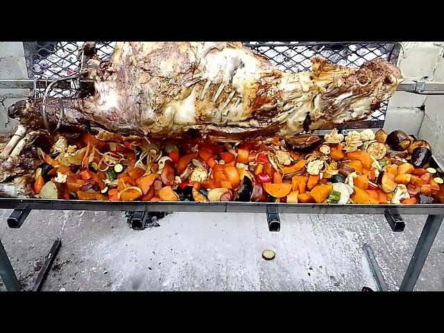 Welcome to Maya Braai and Spit Braai Catering.  whole lamb on spit braai with vegetables 