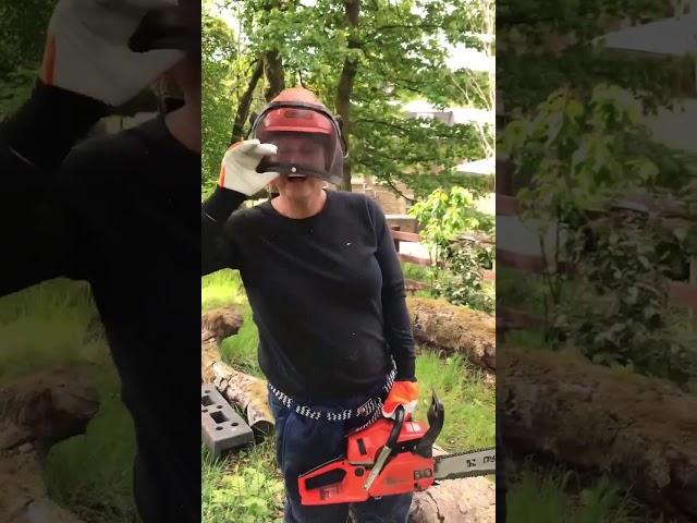 Woman with chainsaw