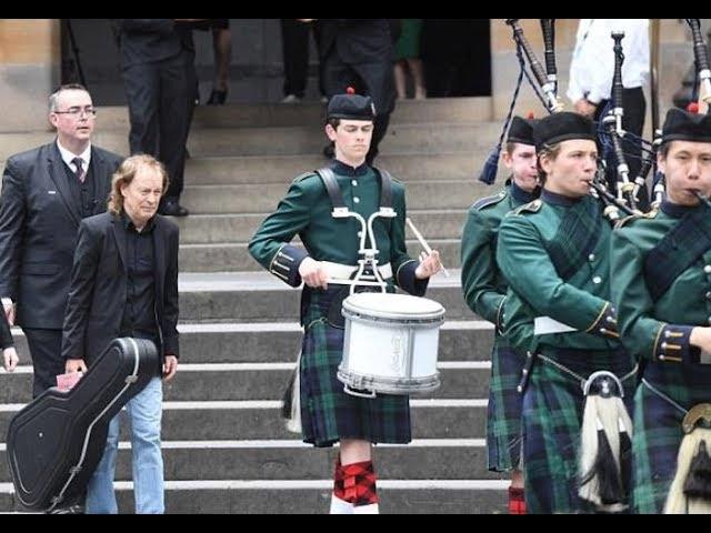 Angus Young and Malcolm Young meet for one last time