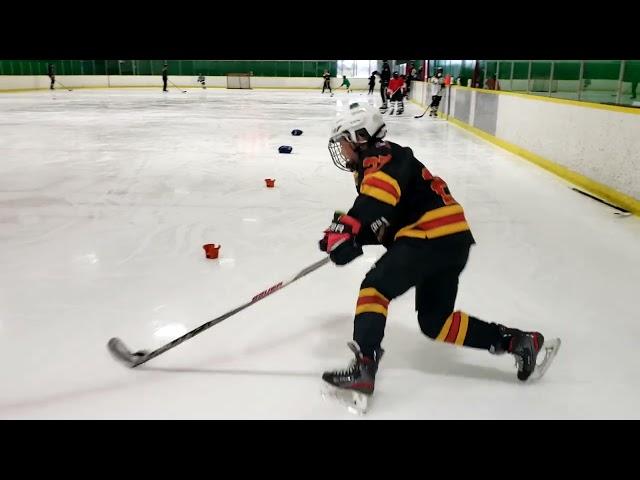 Ice Hockey drills at stick and puck. Demo by first year U13 player, Magnus King