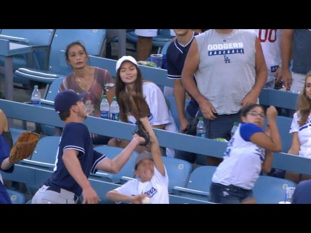 Myers makes a catch in foul ground over a kid