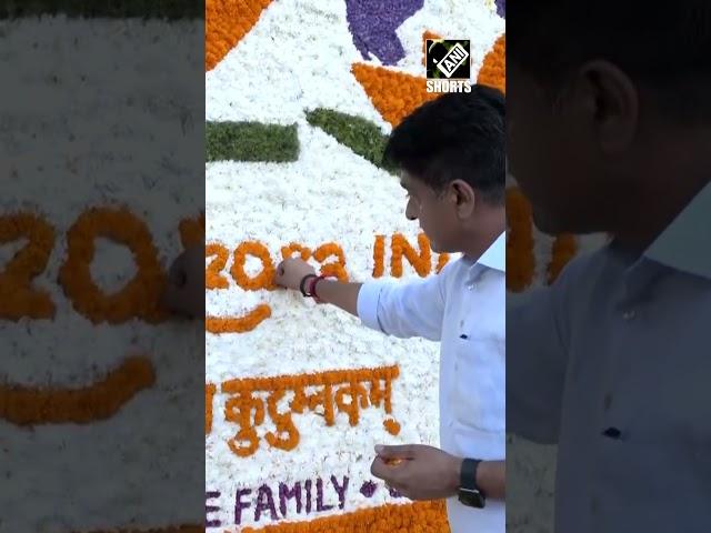 G20 Summit: Banner decorated with flowers at Delhi’s Zakir Hussain Marg