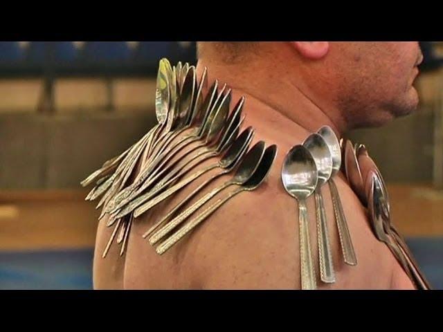 MAGNET MAN STICKS 53 SPOONS TO HIS BODY - BBC NEWS